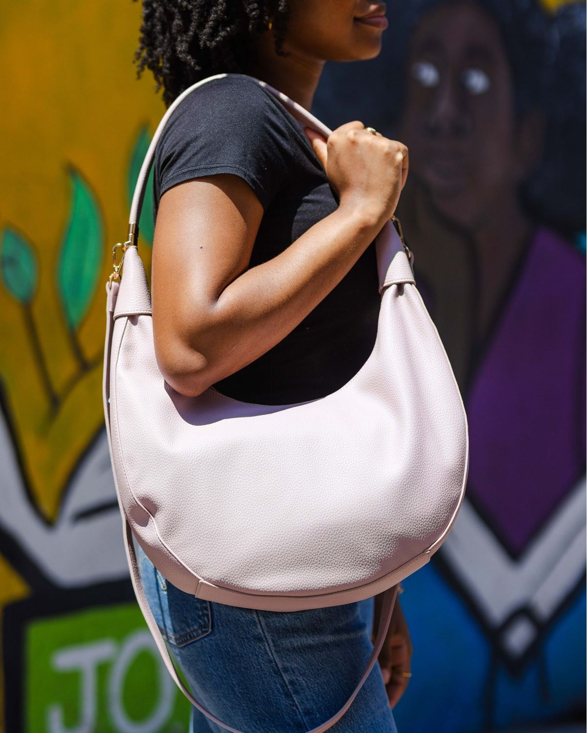 The Alex, a vegan leather crescent crossbody bag by The Bag Depot.