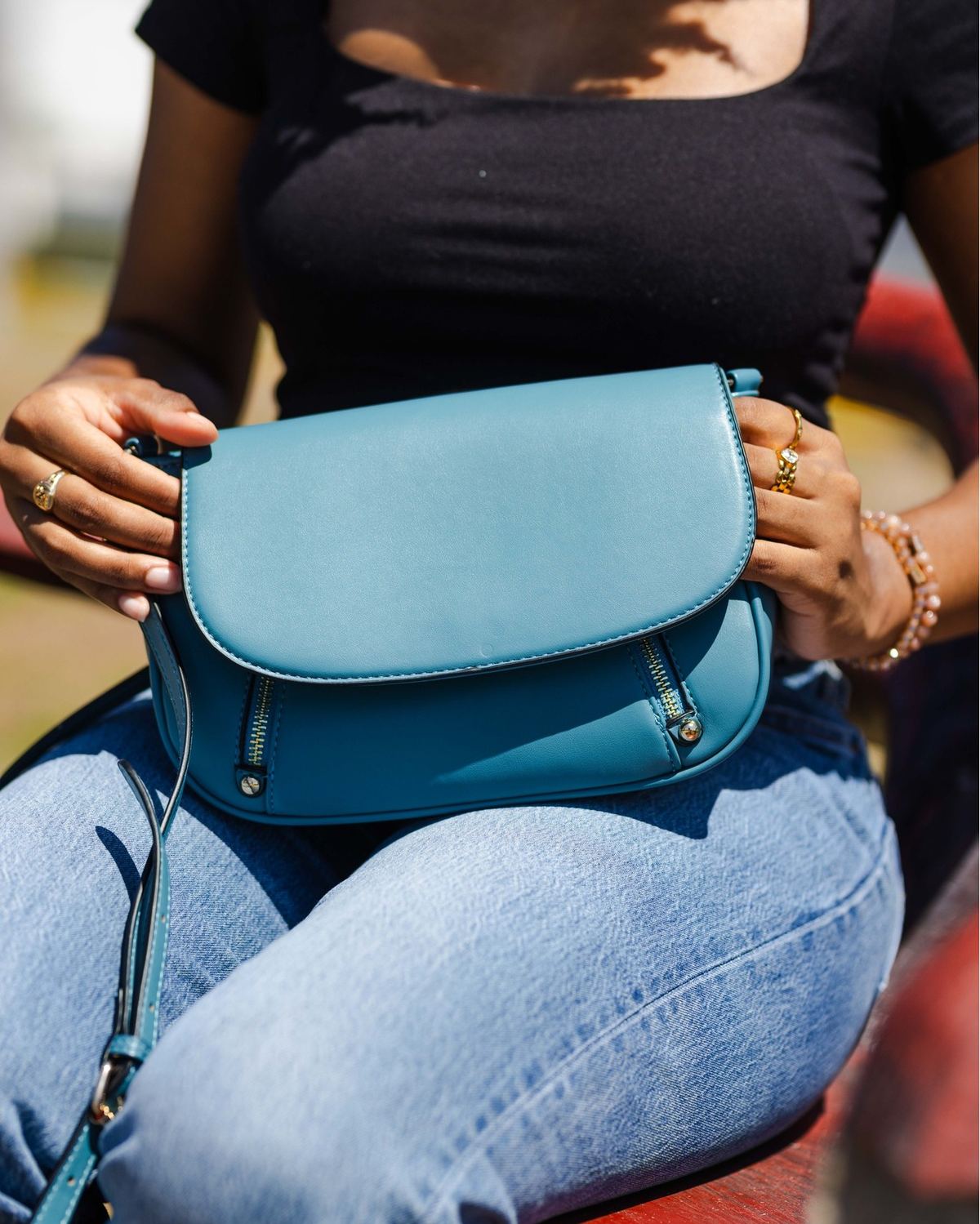 The Lindsay crossbody bag by The Bag Depot with dual front zip pockets.