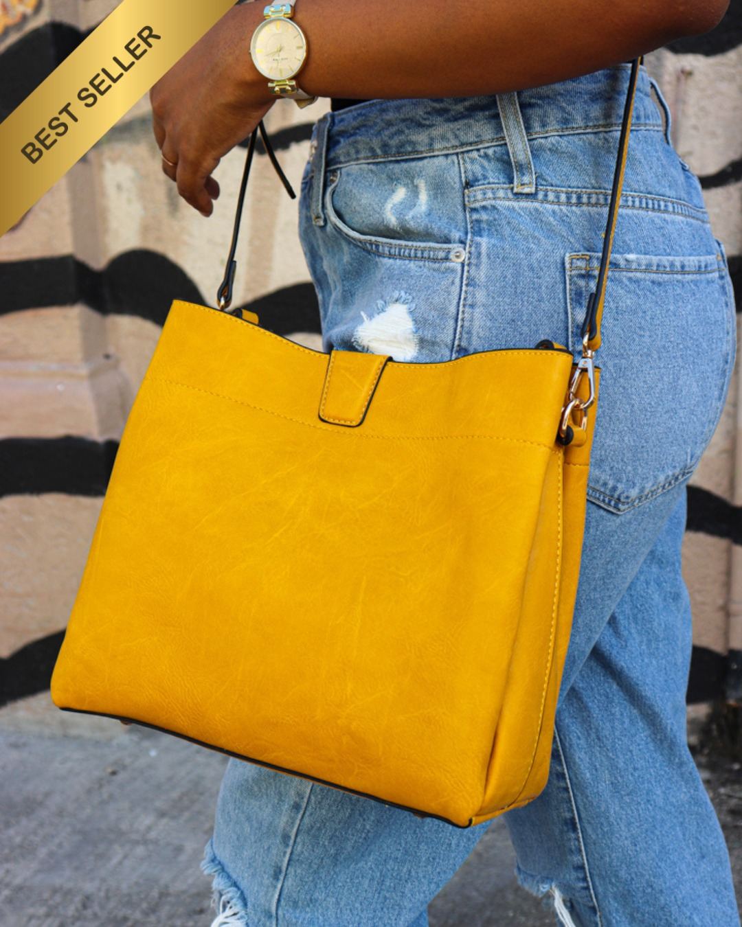 The Tati, a larger crossbody bag by The Bag Depot in a minimal style.